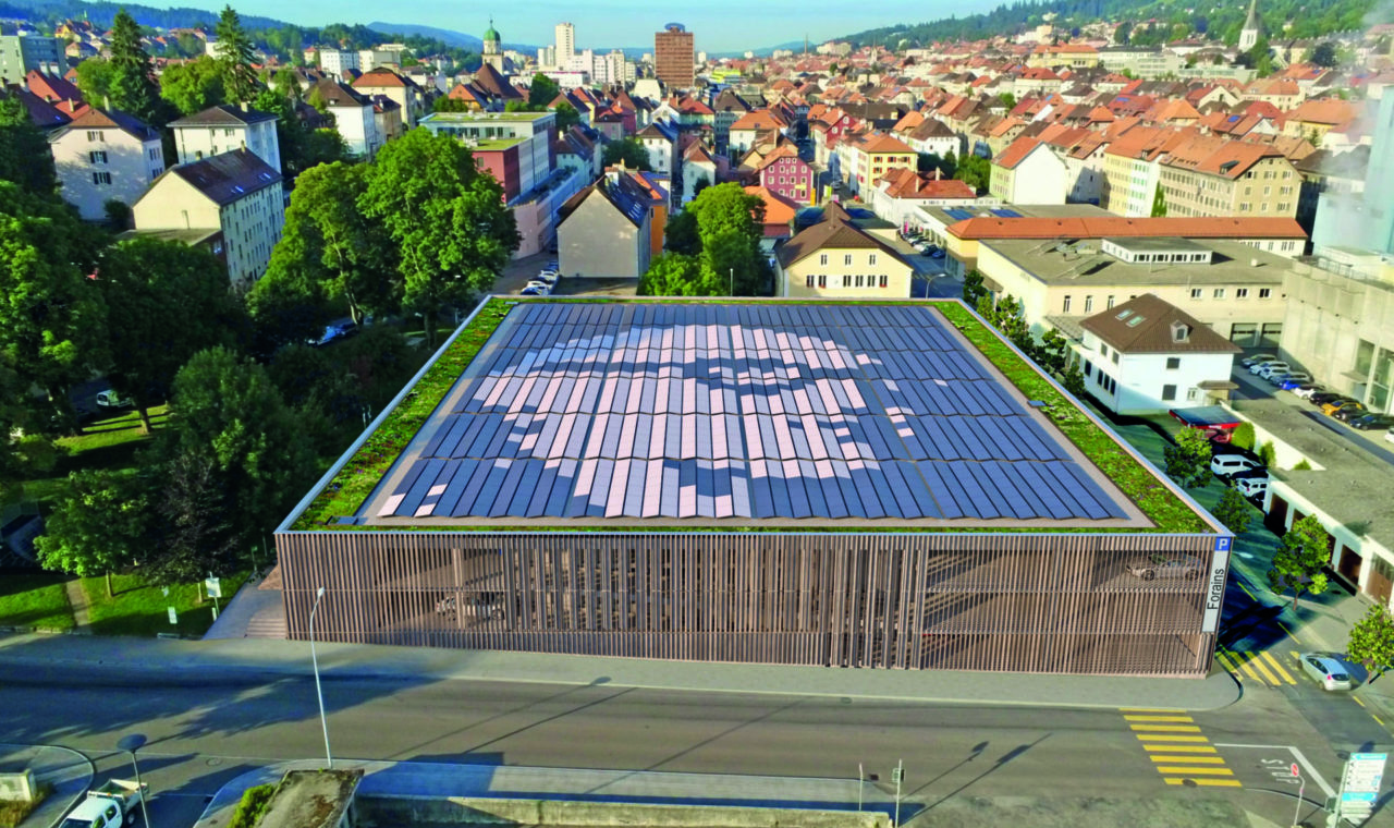 Vue aérienne, et de synthèse, du futur parking de la Ronde. La toiture sera entièrement couverte par des panneaux solaires. On y verra une fresque à l’effigie de Le Corbusier, réalisée avec la technologie de Solaxess. (Photo Evard Architectes)